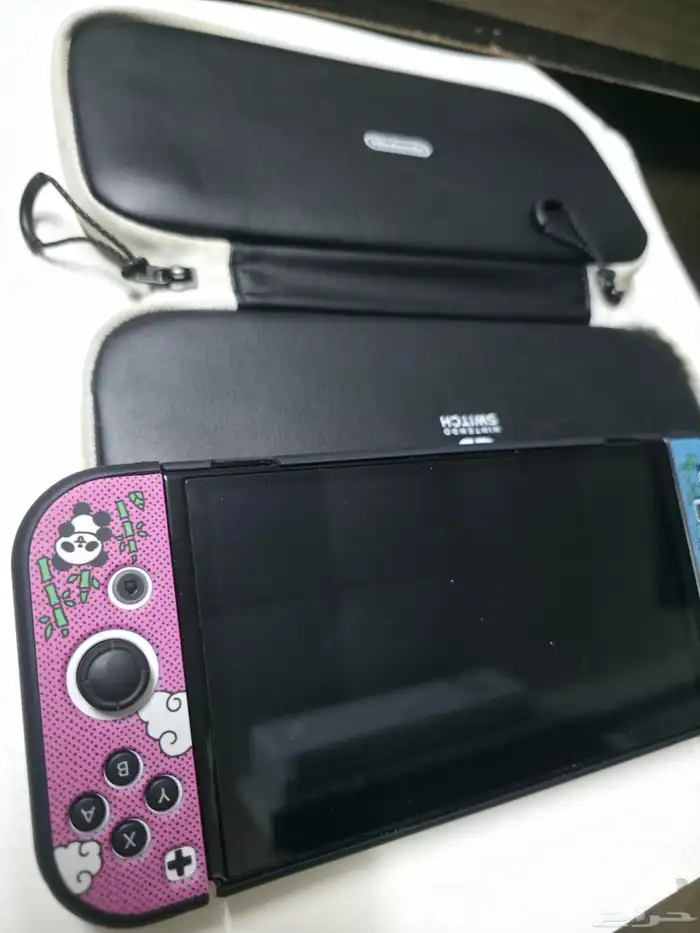 Nintendo oled جهاز نينتيندو اولد مع العاب فيه نضيف شبه جديد 0