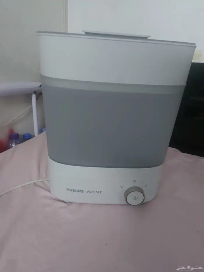 جهاز تعقيم وتجبفيف وتخزين الرضاعات 1