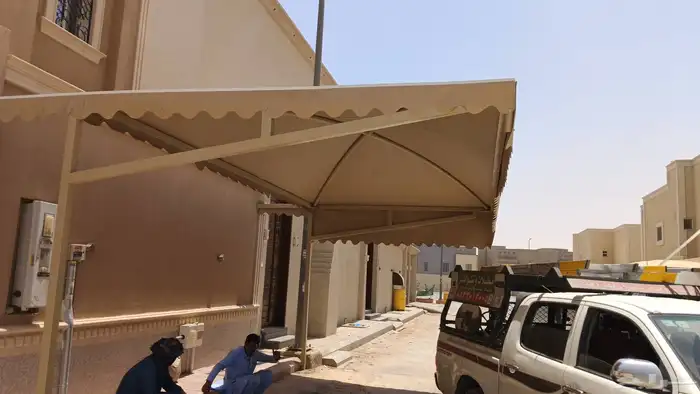 سندويش بانل تركيب سندوتش مظلات مواقف سيارت مظلات جلسات لكسان 26