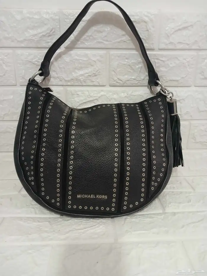 شنط كوتش دكنى مايكل كورس موديلات حديثه 30