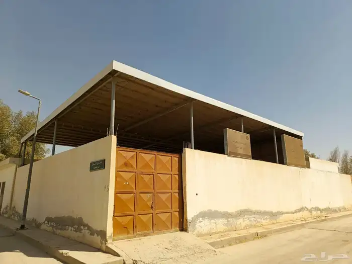 مظلة بحي الغنامية حديد 15في 13 0