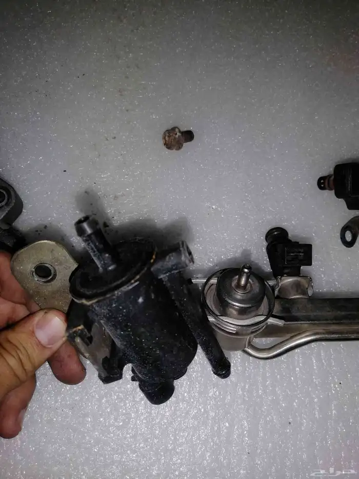 قطع غيار ونيت ميتسوبيشيL200 بوابة وبخاخات ومرفقاتها 1