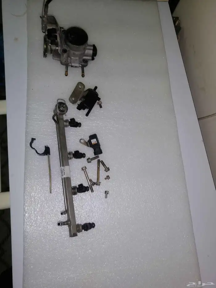 قطع غيار ونيت ميتسوبيشيL200 بوابة وبخاخات ومرفقاتها 0