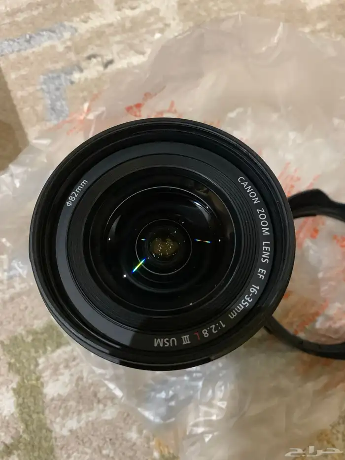 عدسات تصوير بحالة ممتازة وفلاش Godox V1C 11