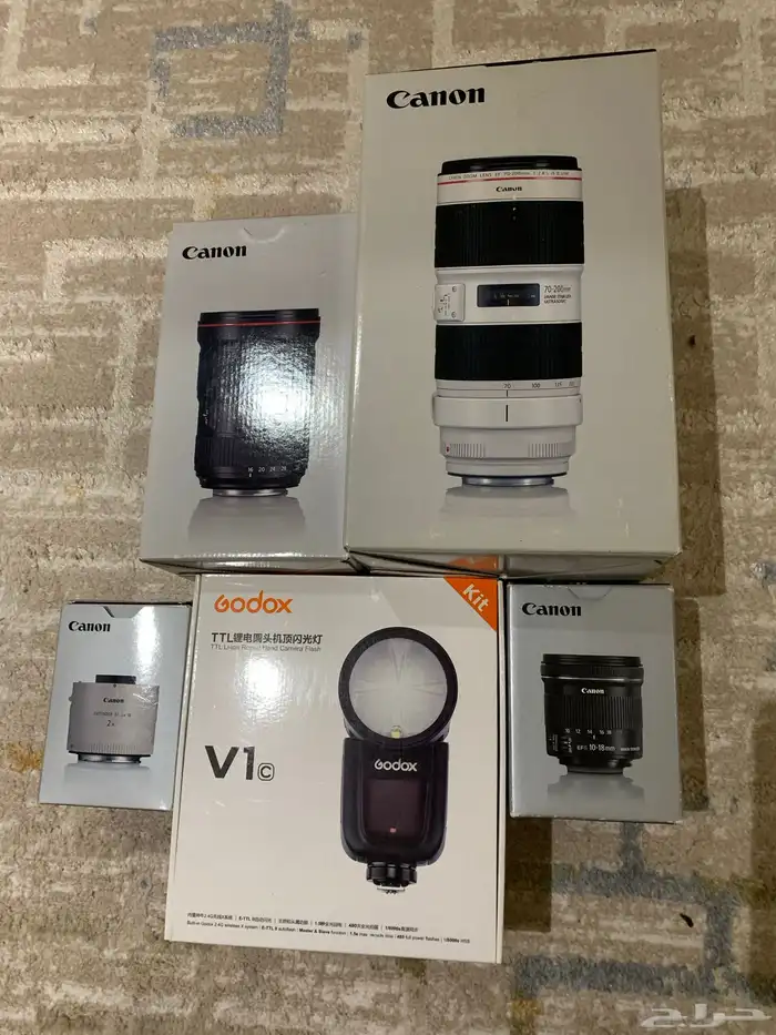 عدسات تصوير بحالة ممتازة وفلاش Godox V1C 0