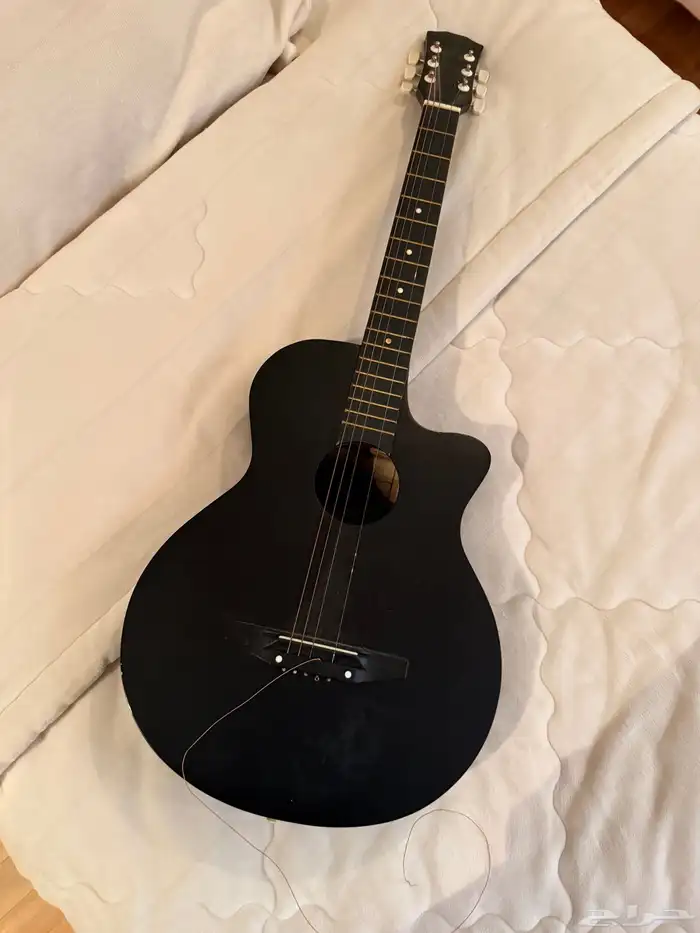 قيتار مع شنطه و اوتار 0