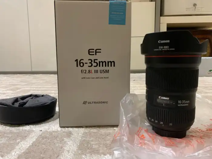 عدسات تصوير بحالة ممتازة وفلاش Godox V1C 13