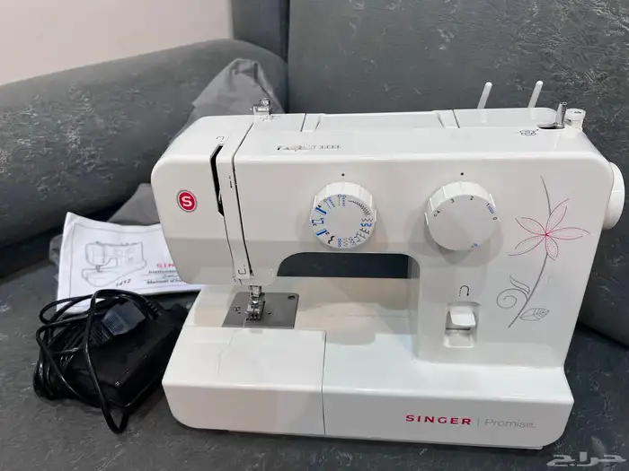 ماكينة خياطة نظيفة و شبه جديدة SINGER promise 5