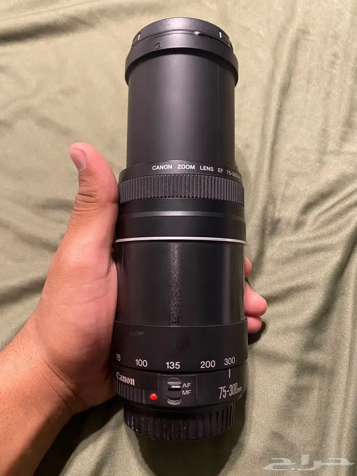 عدسة كانون 4