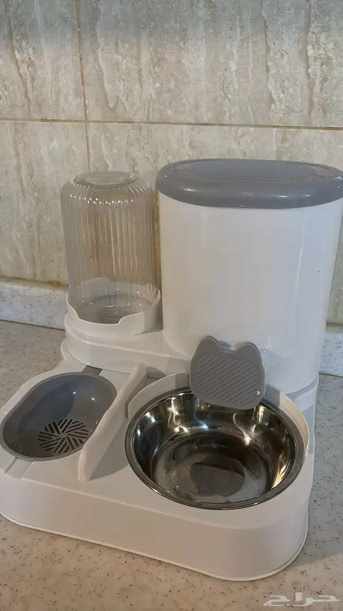 موزعة طعام للقطط 0