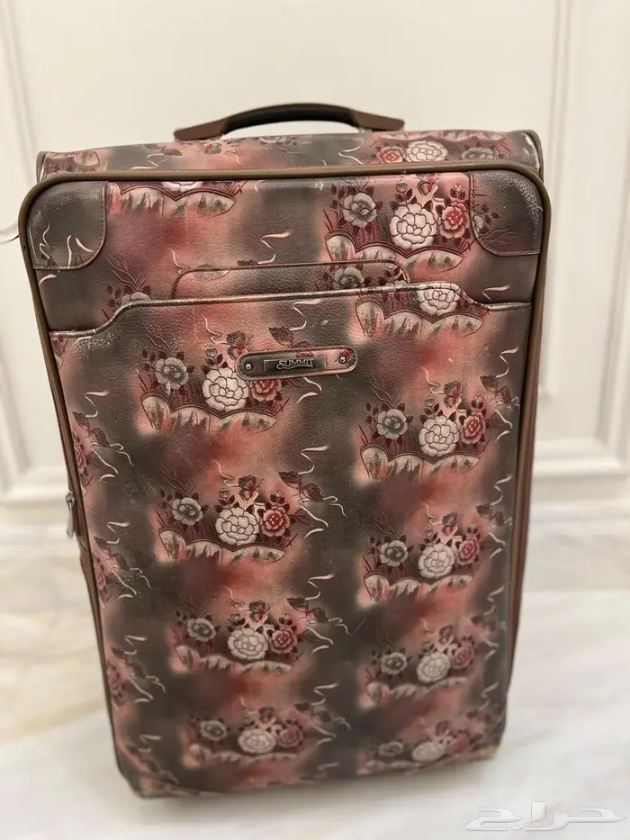 شنطه للبيع شبه جديده جلد مشجر 1