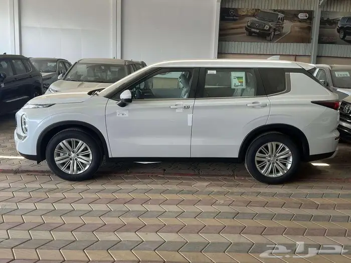 ميتسوبيشي اوتولاندر 2025 ستاندر 7 راكب دبل اقساط و كاش 4