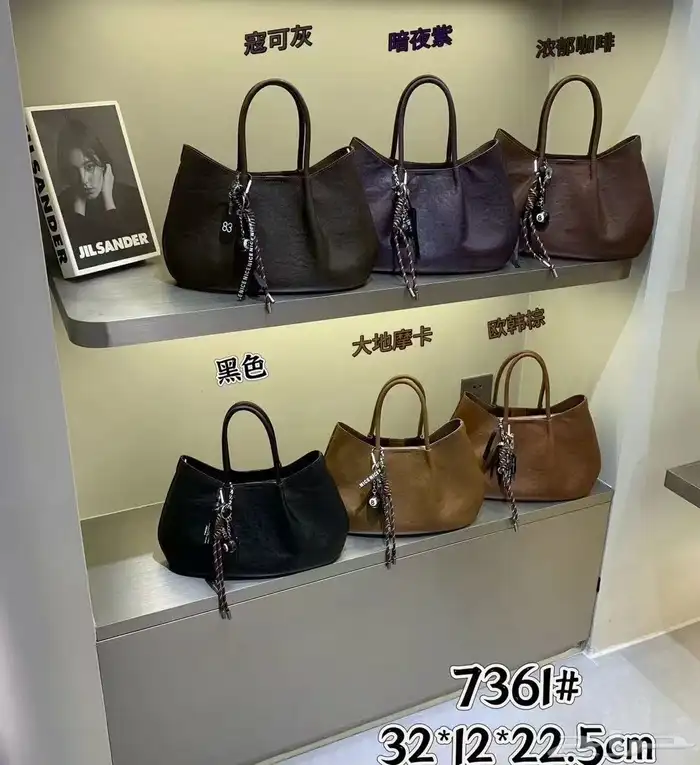 شنط يد جلد طبيعي درجة أولى اسعار جملة 0