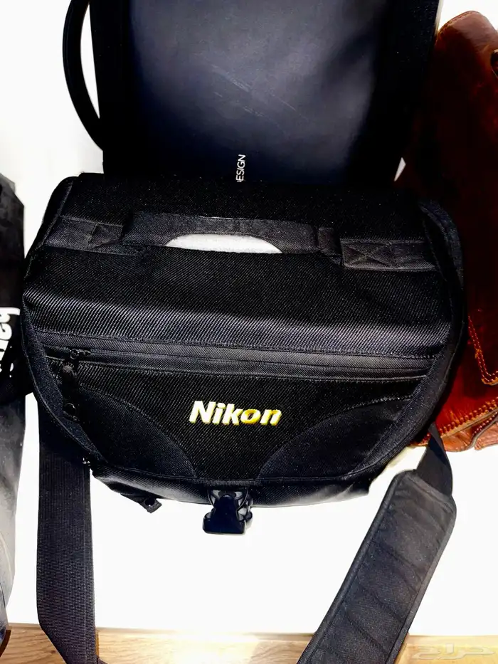 طقم تصوير احترافي Nikon D5100 مع عدستين و ترايبود   شنطه 5