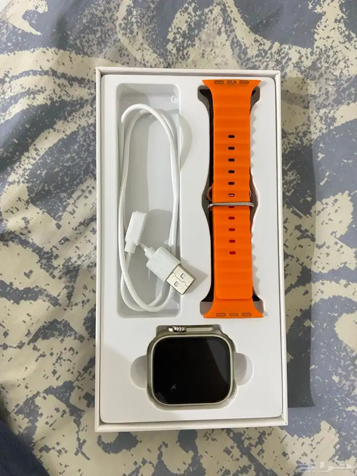 ساعة اندرويد فيها جلدين اسود برتقالي 3