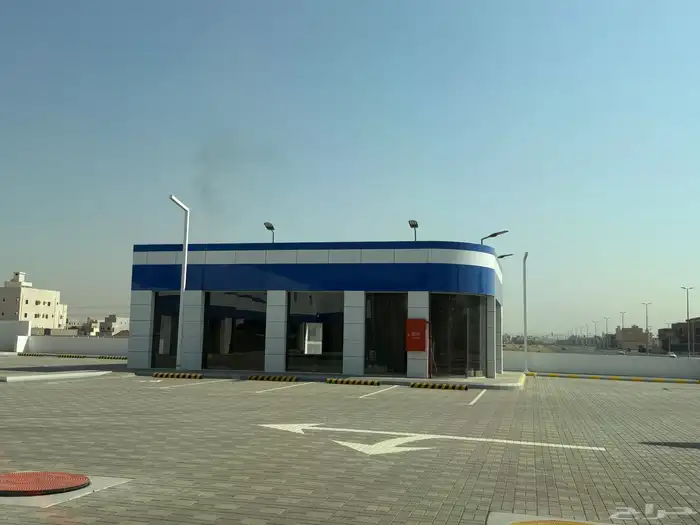 محطة بنزين بها محلات تجارية 0