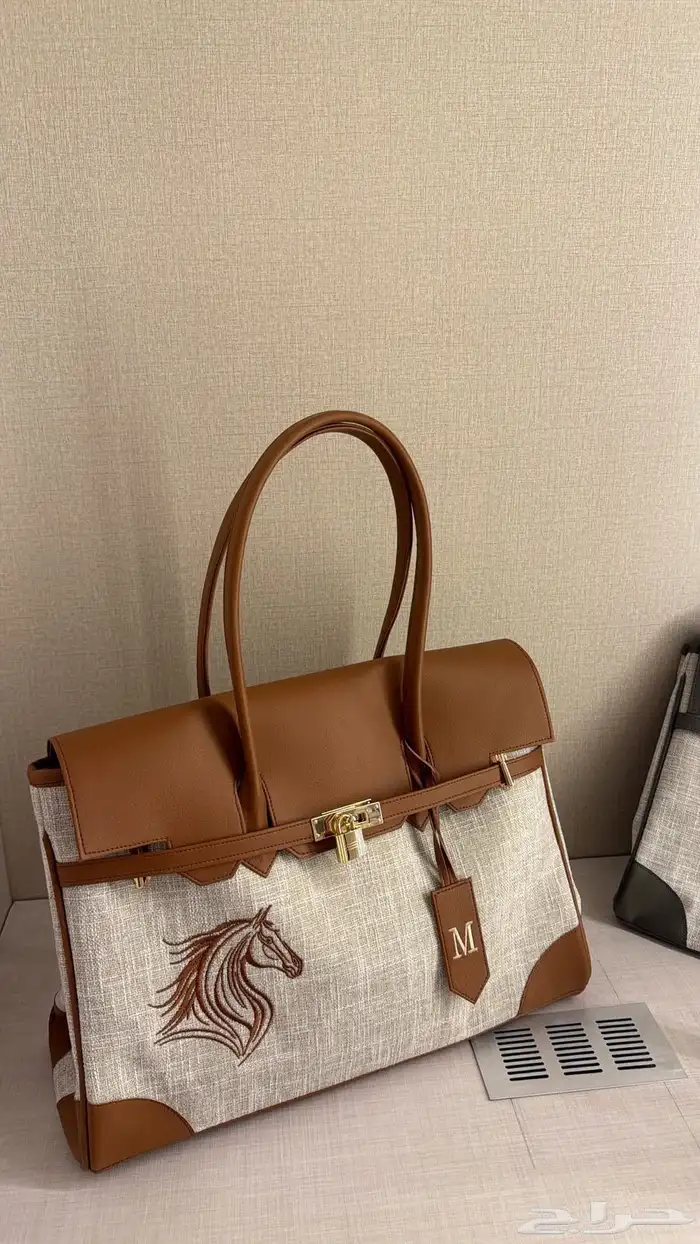 شنطة عملية قماش وجلد جودة ممتازه 0