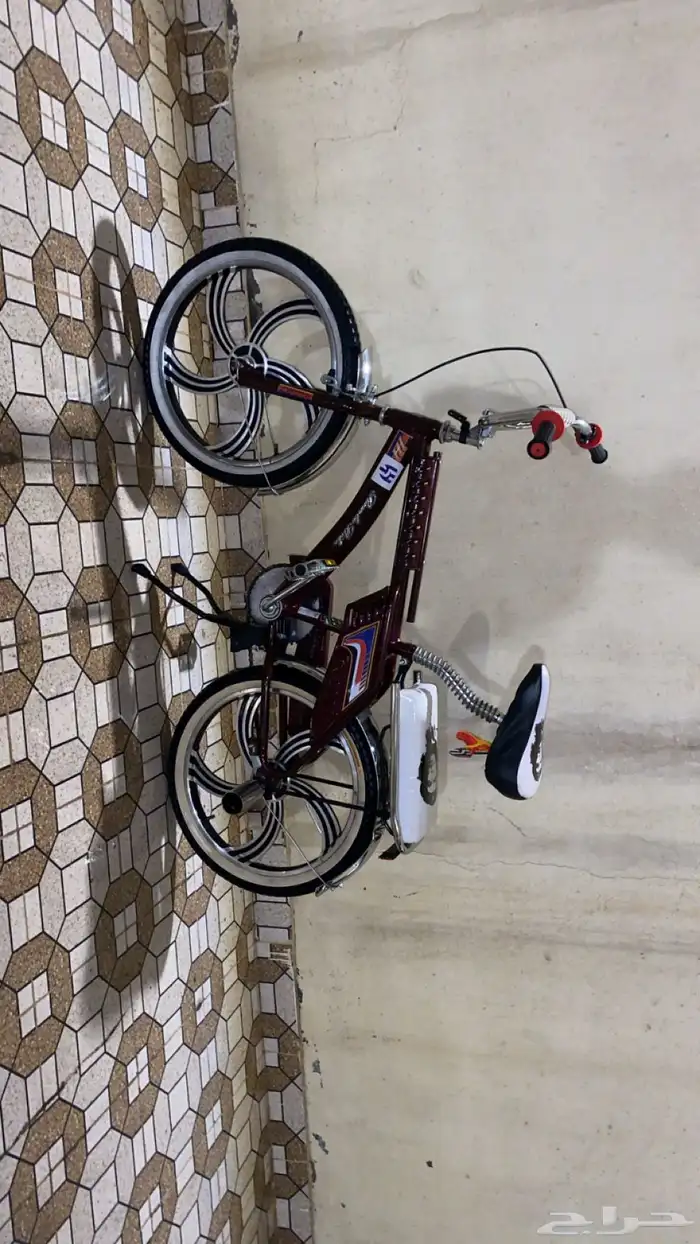 السلام عليكم سيكل رامبو لون عنابي غامق على السوم 0