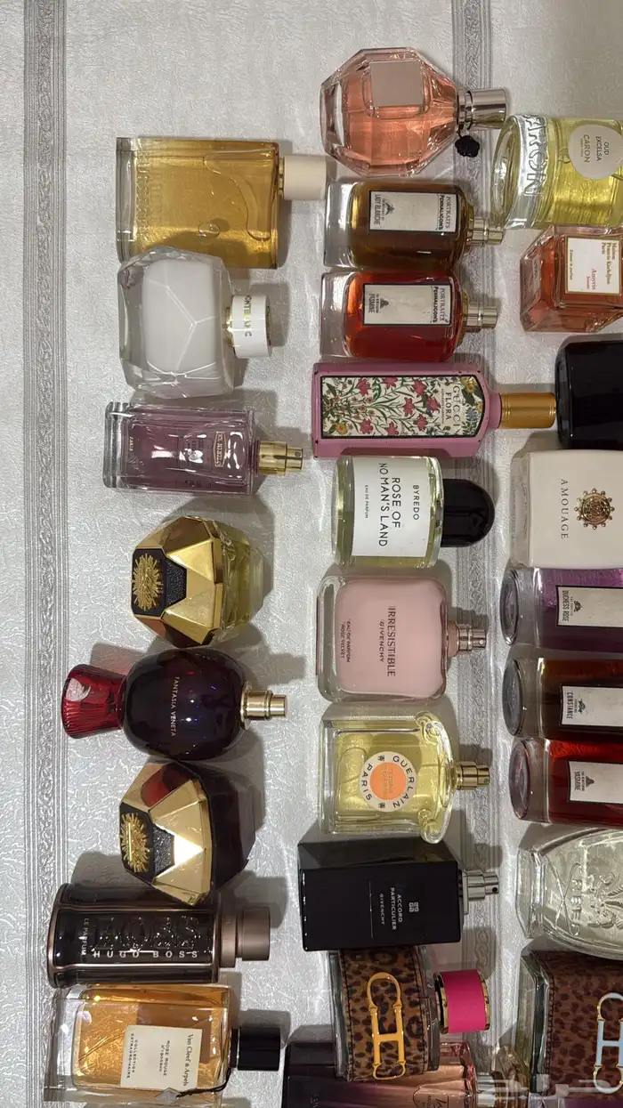 عطور ماركات اصليه بدون كراتين استوكات جديده بربع القيمه 45