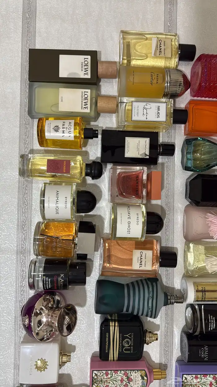 عطور ماركات اصليه بدون كراتين استوكات جديده بربع القيمه 38