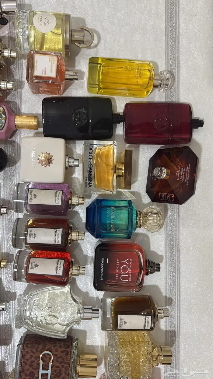 عطور ماركات اصليه بدون كراتين استوكات جديده بربع القيمه 44