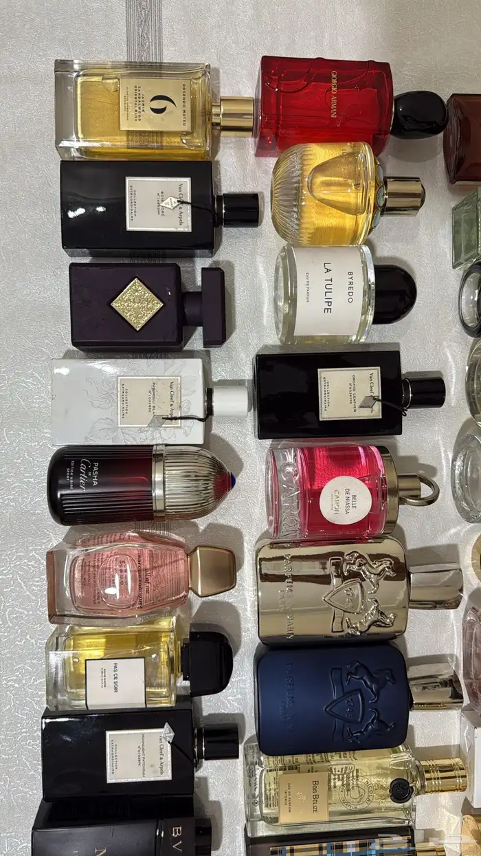 عطور ماركات اصليه بدون كراتين استوكات جديده بربع القيمه 33