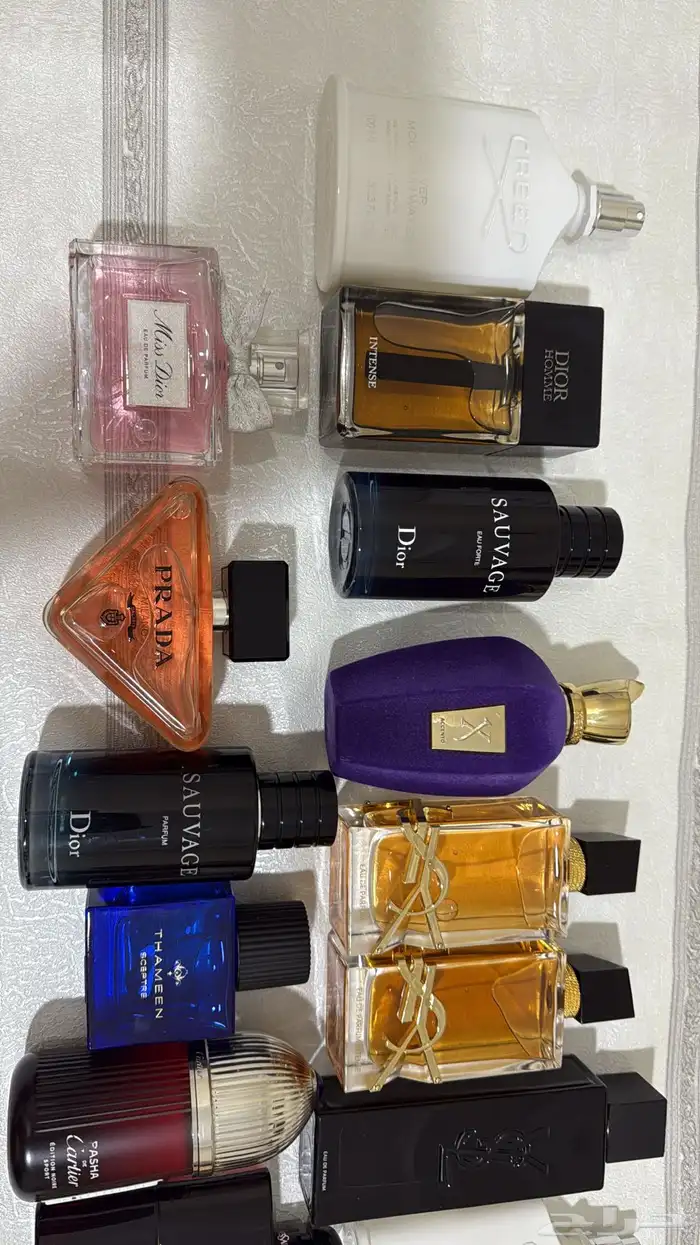 عطور ماركات اصليه بدون كراتين استوكات جديده بربع القيمه 24
