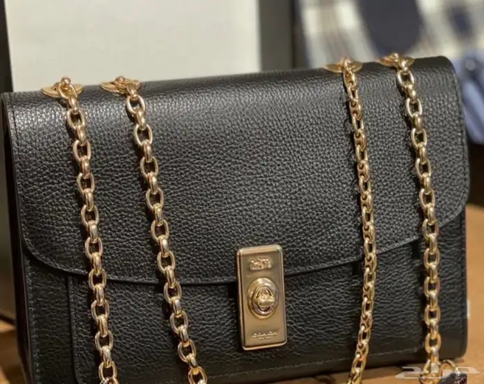 شنطة كوتش اصلية جديدة 1