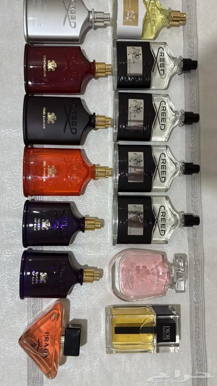 عطور ماركات اصليه بدون كراتين استوكات جديده بربع القيمه 12