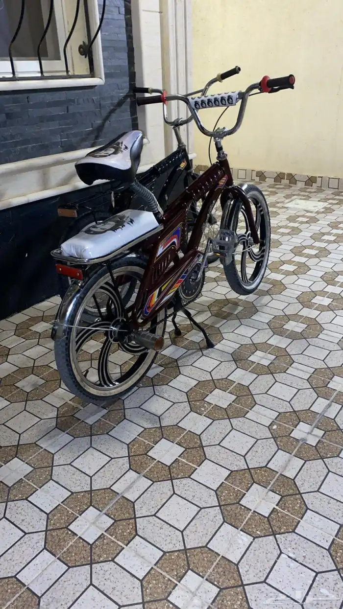 السلام عليكم سيكل رامبو لون عنابي غامق على السوم 5