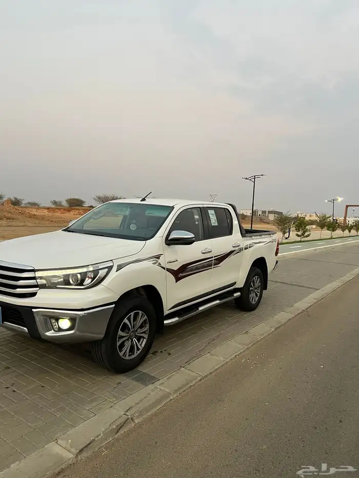 هايلكس للبيع دبل 2018 الممشى 309000 قير عادي بنزيم 2