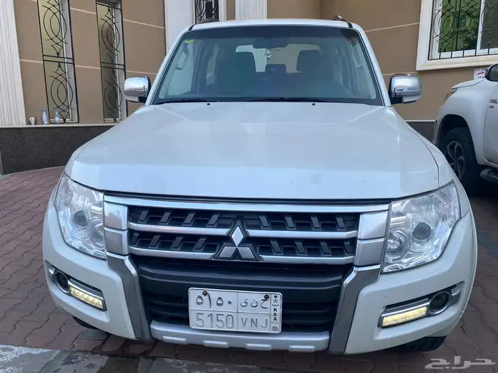 باجيرو ربع 2016 ابيض 13