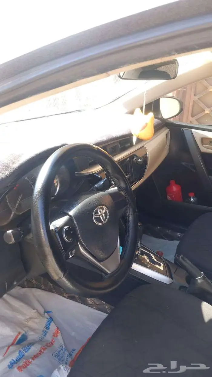 تايوتا كورولا موديل 2015 اللون لولوي 4