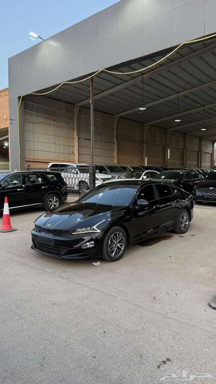 كيا 5 2021 عداد 126000 اسود نص فل 1
