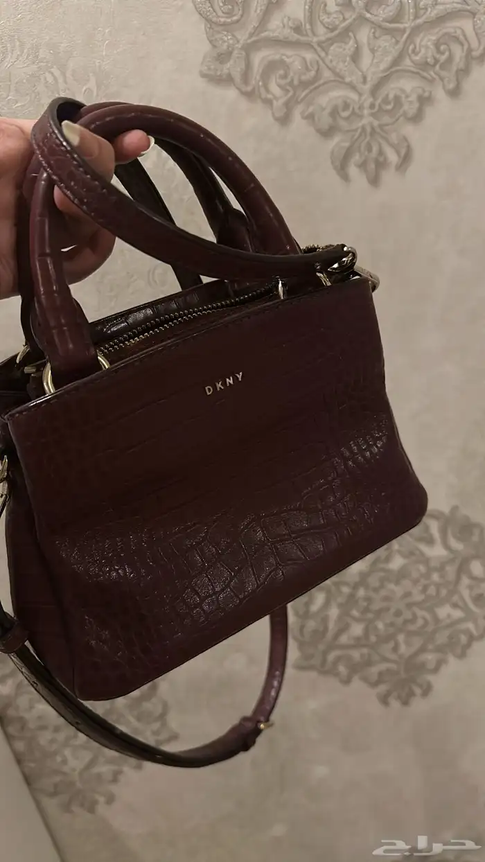 شنطة دكني لون برغندي 1