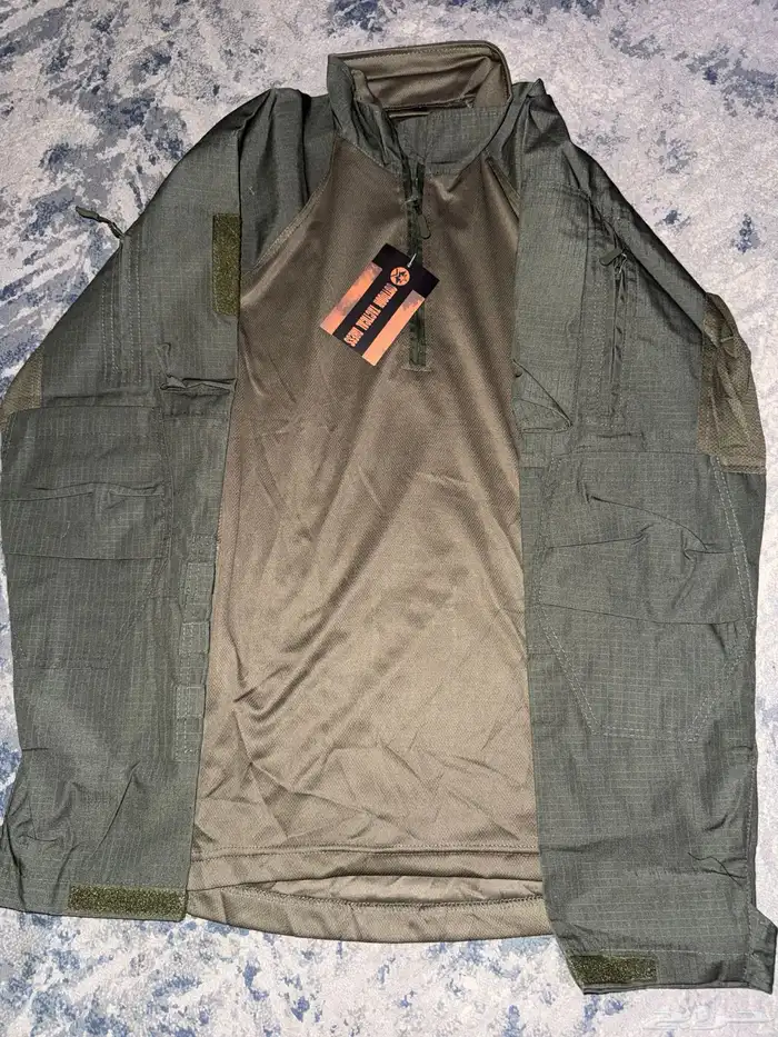 لبس صيانة قطعتين زيتي 1