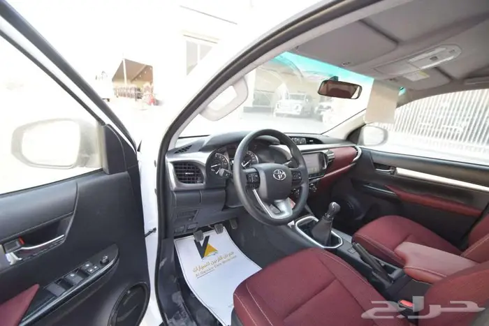 هايلكس 2025 بنزين رفرف قير عادي بريمي كاش وأقساط أقل سعر 7