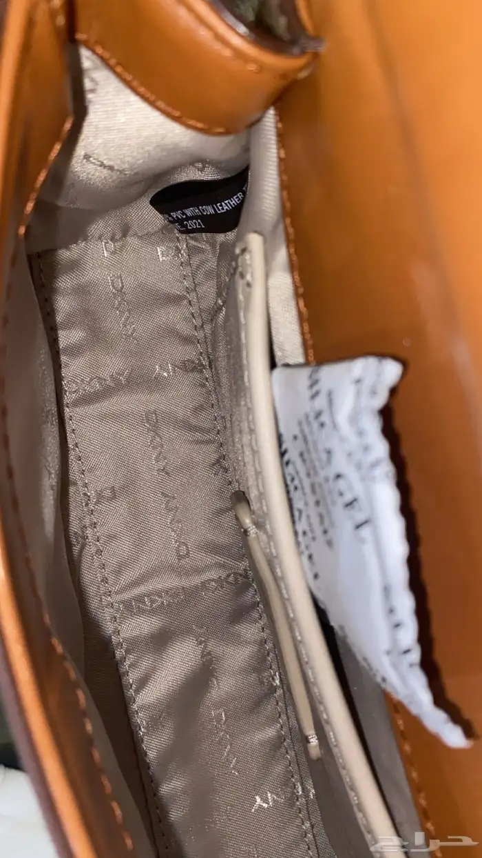 فايندرا حلق فضه ساعه ديور درجه اولى وشنطه كروسبوديDKNY 1