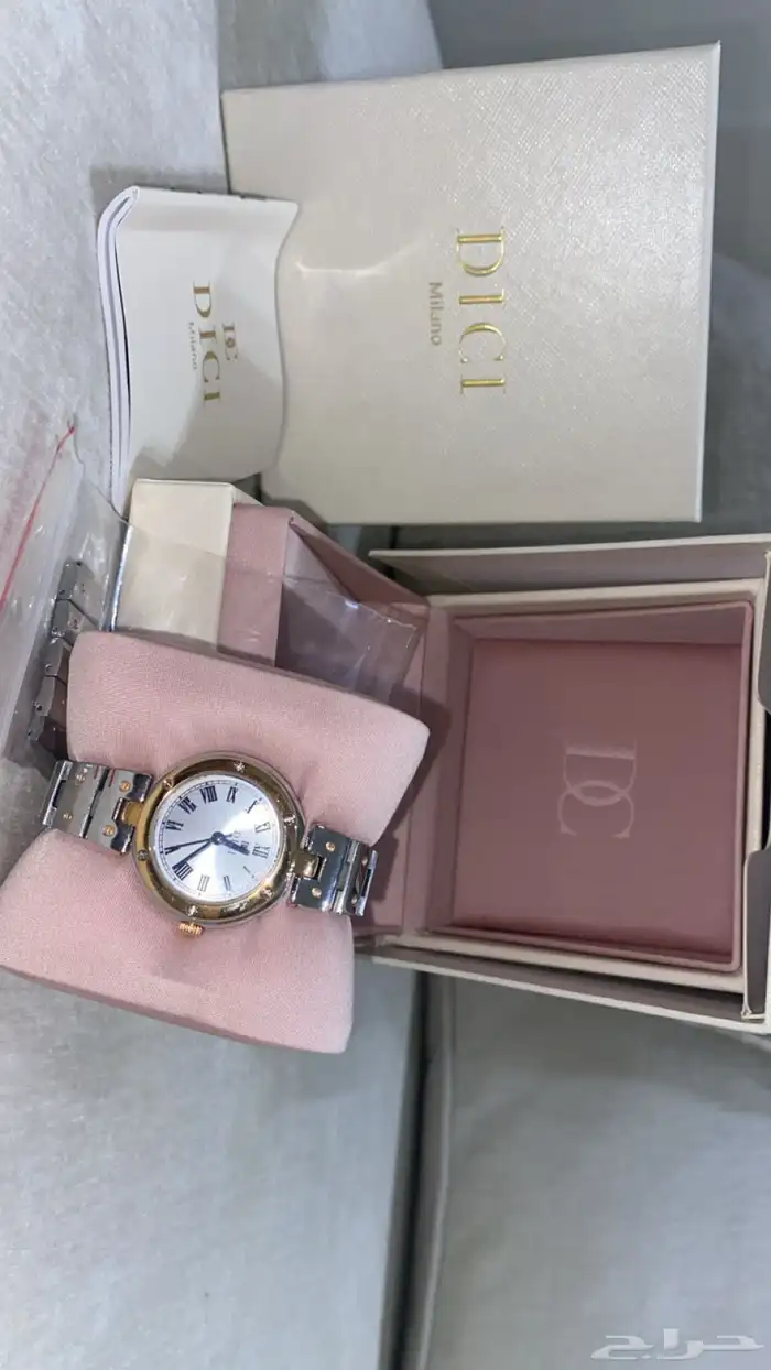 فايندرا حلق فضه ساعه ديور درجه اولى وشنطه كروسبوديDKNY 3