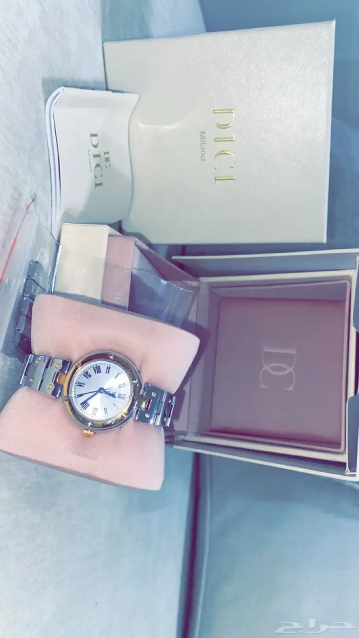 فايندرا حلق فضه ساعه ديور درجه اولى وشنطه كروسبوديDKNY 4