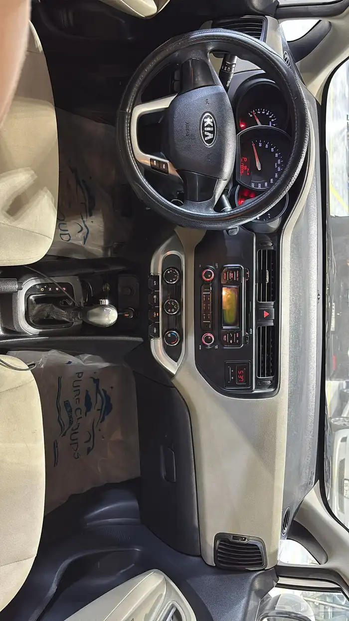 كيا ريو نضيفه جدا 11