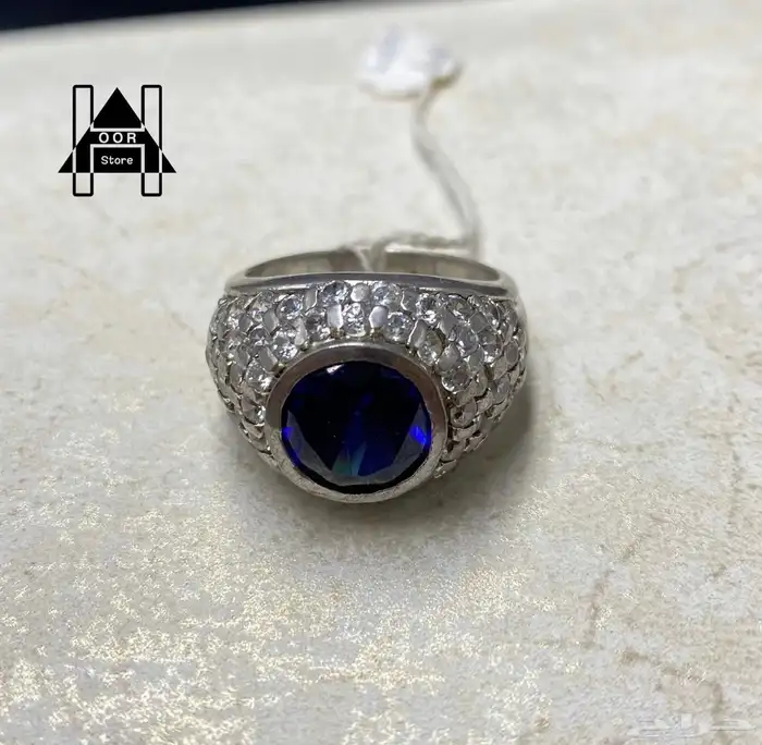 خاتم فضة راقي وفخم عيار 925 وبفص ياقوت أزرق ومرصع بزركون 0