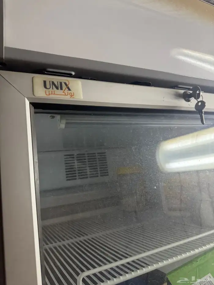 ثلاجة محل بحالة ممتازه وثلاجه غرفه وأرفف ودواليب وأرفف محل 0