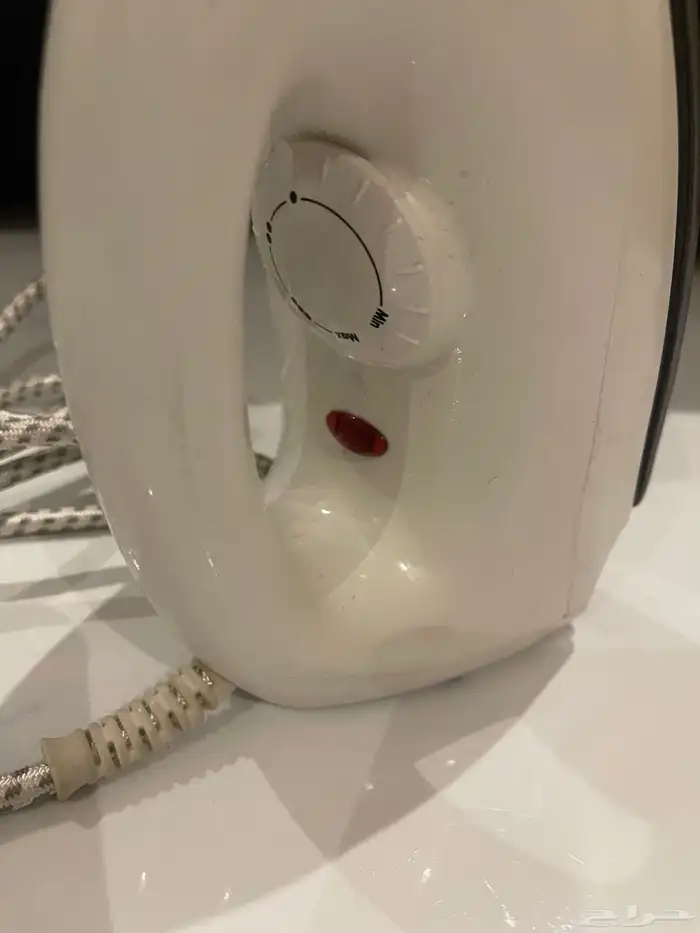 مكوى ملابس 1