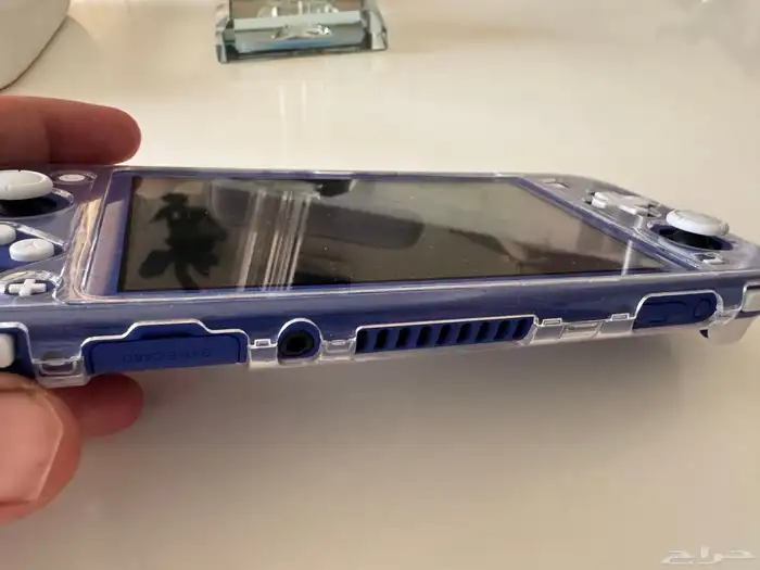 نيتندو سويتش جهازين مع شريطين العاب كراش وسوبر ماريو 1