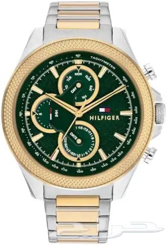 green dial gold bezel watch تومي 0