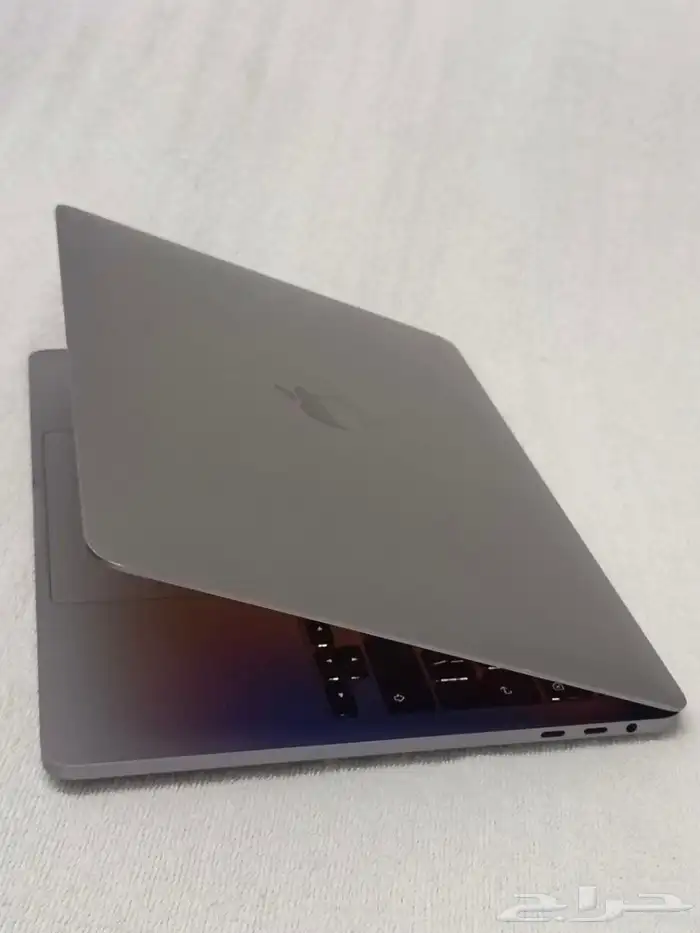 MacBook Pro Touch Bar Look like new with charger 1