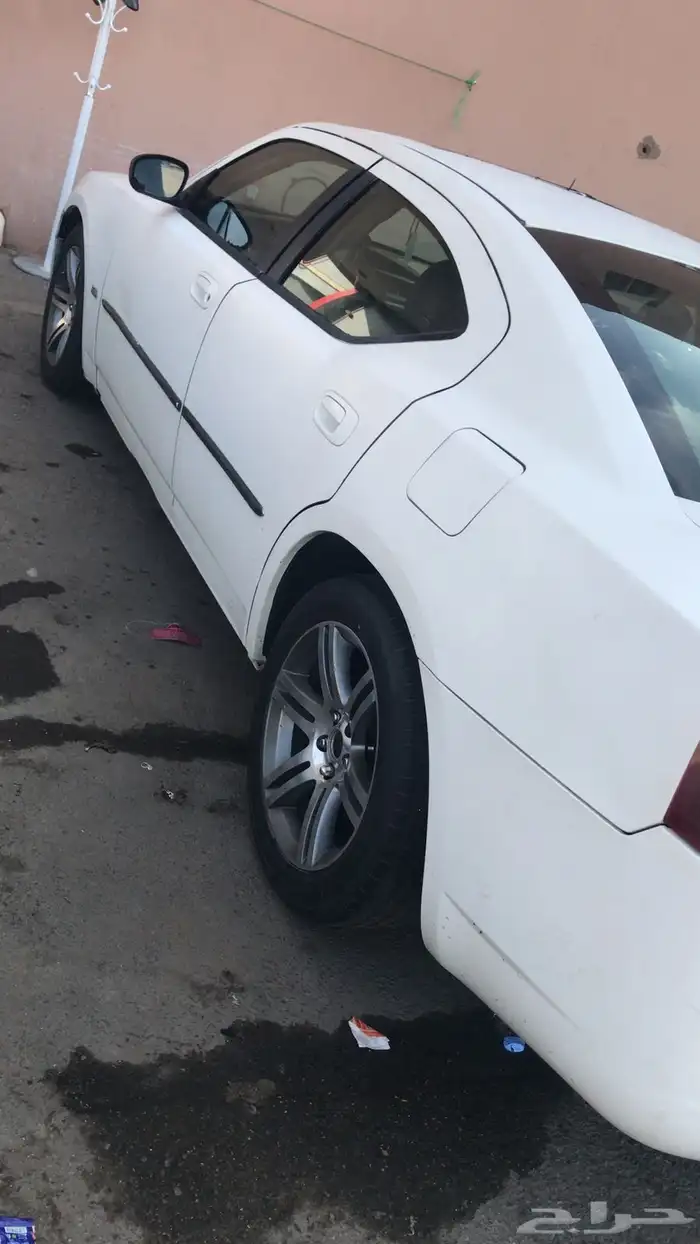 دوج موديل 2006 ابيض ست سلندر 7