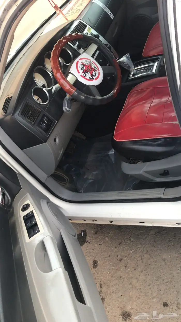 دوج موديل 2006 ابيض ست سلندر 4