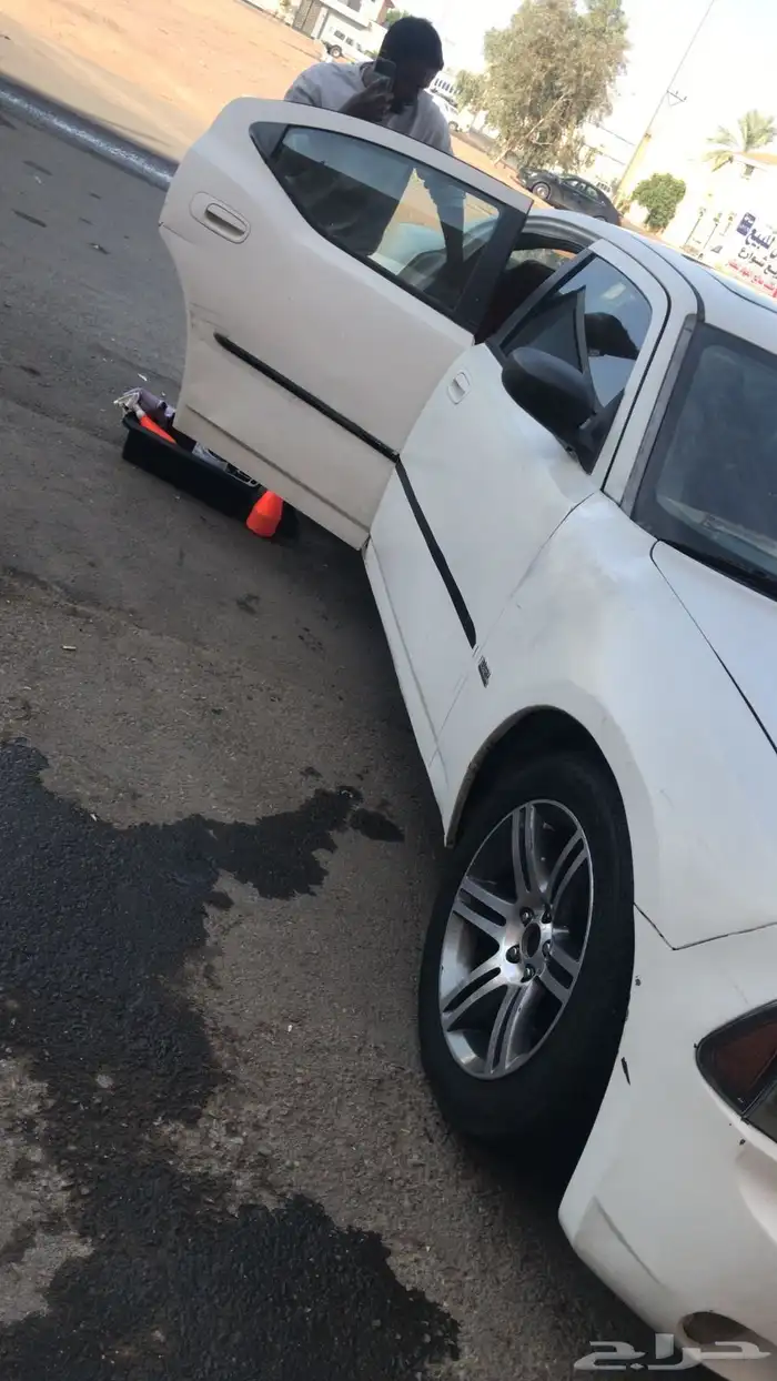 دوج موديل 2006 ابيض ست سلندر 0